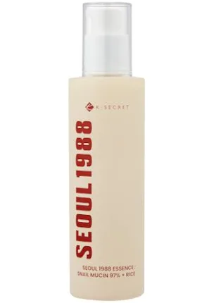 Esencia facial con mucina de caracol y arroz de KSecret, en envase color crema con letras rojas.